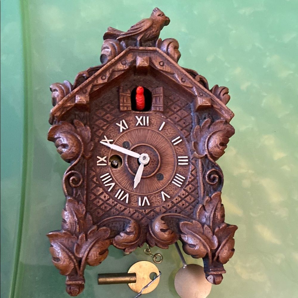 Intricate Brown Cuckoo Wall Clock with red bird Keebler Co.